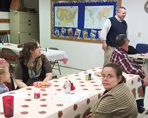 Briarwood families sharing a fellowship meal together